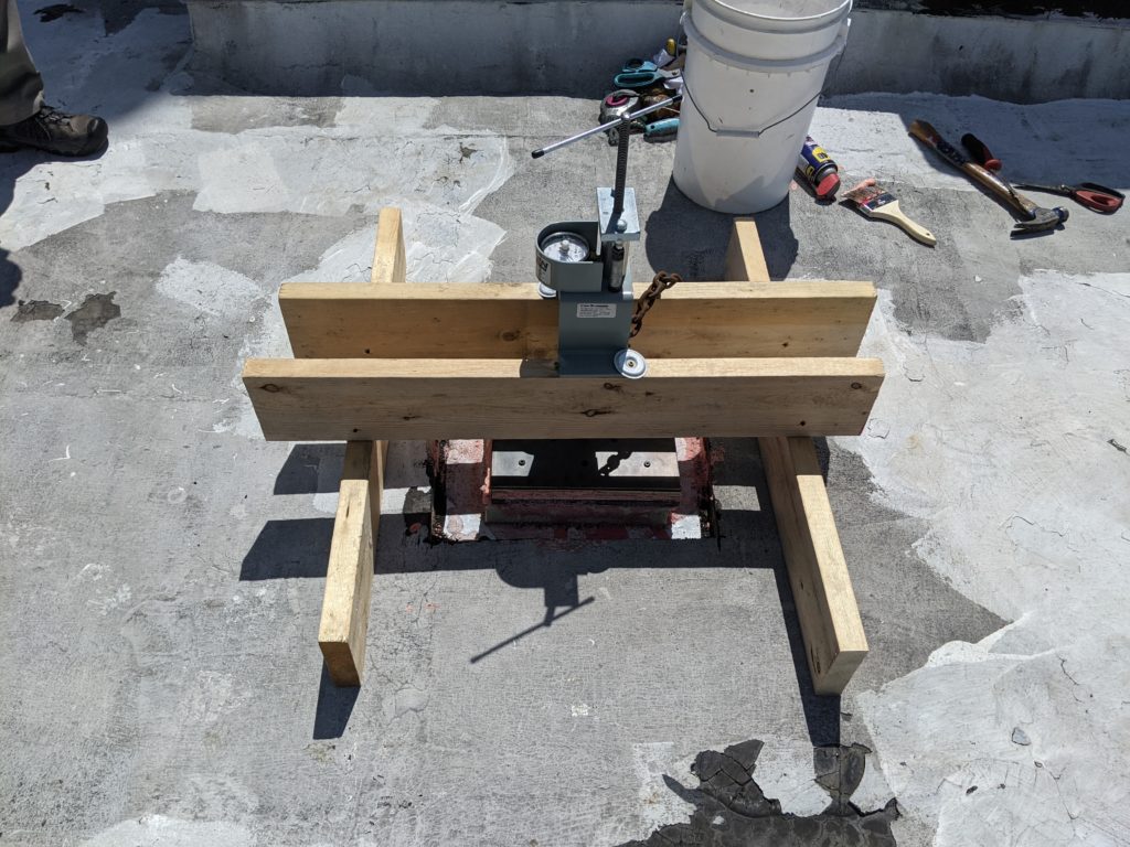 TPO Roof system mock up pull test passed with flying colors maxing out the gauge over 1000lb pull resistance before separating the system. The system consisted of Fully adhered 80mil Firestone TPO, Foam attached 5/8” dens deck prime, Foam attached 2” polyiso, and V force Vapor Barrier directly over clay tile deck.