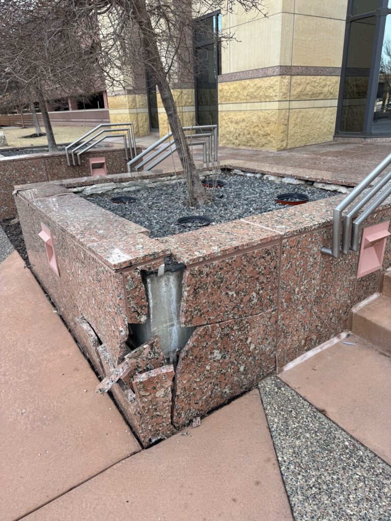 Damaged planter before work